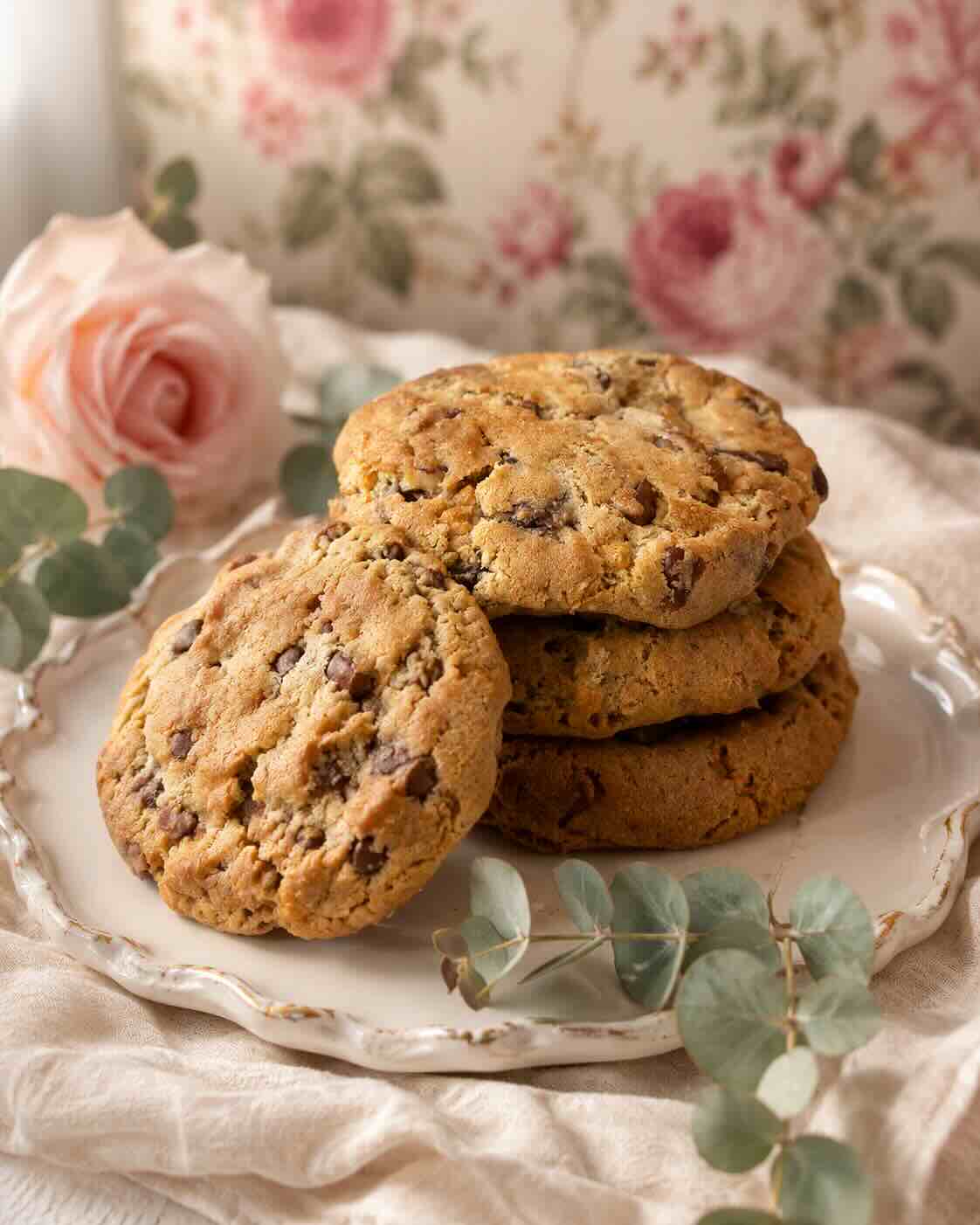 Butterscotch pecan cookies stacked on a vintage plate with a blush rose, SweetScape Bakery in Scottsdale